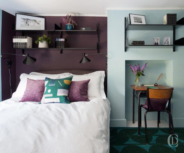 Bedroom | View of a double bed with a feature wall in an alcove | Victorian Townhouse